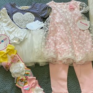 Two dresses and bows